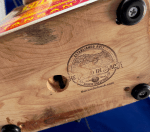 Closeup of bottom of lamp showing feet and Road in Back stamp.